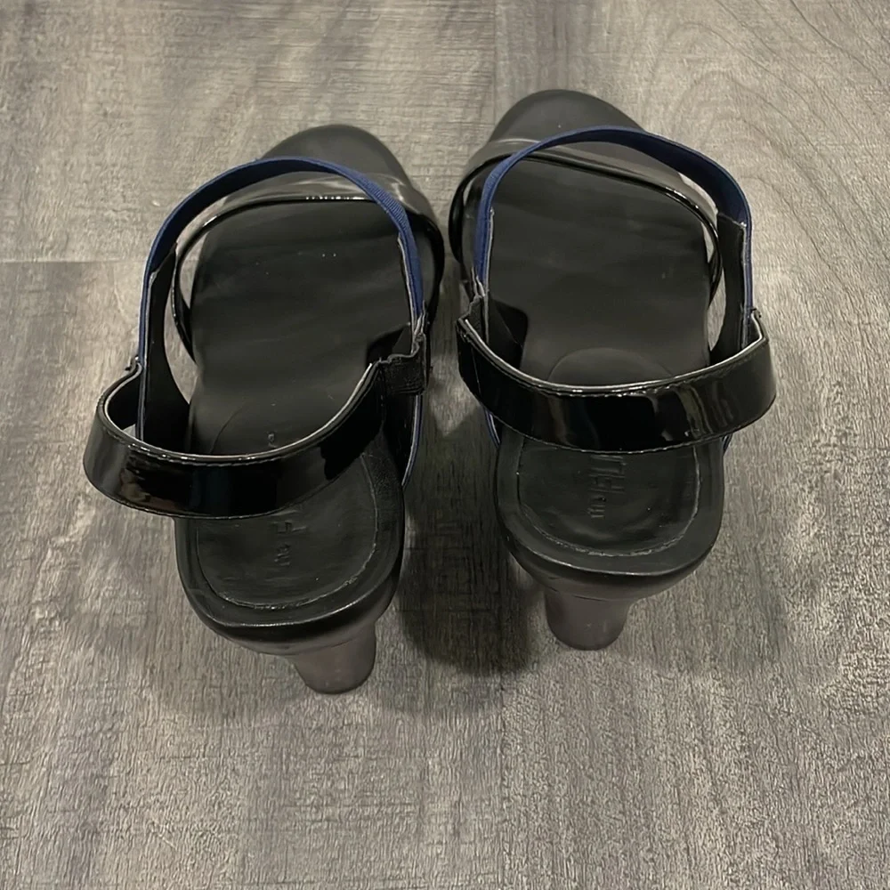 The Flexx blue & black give a lot wedge sandals size 9